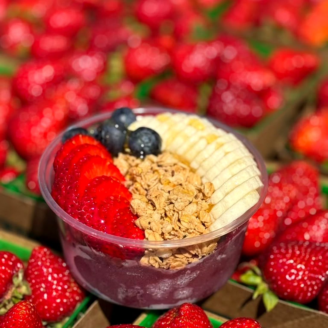 Açaí bowl with strawberries, blueberries and granola